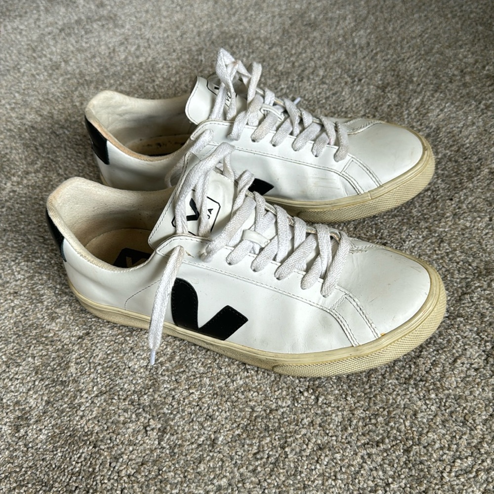 Veja sneakers in classic white and black.